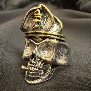 Badass Captain Skull Ring – Bold Statement Jewelry - Make a statement with this bold and detailed Captain Skull ring! Crafted from durable stainless steel in silver and gold tones, this piece features a smoking skull wearing a sea captain’s hat. Adjustable size for a perfect fit. Ideal for rock, punk, and alternative styles.  🚫 No bargaining, but I offer bundle discounts! 📦 Fast and secure shipping.  