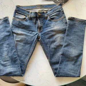 Blå jeans från Nudie Jeans - Snygga blå jeans från Nudie Jeans, aldrig använda 