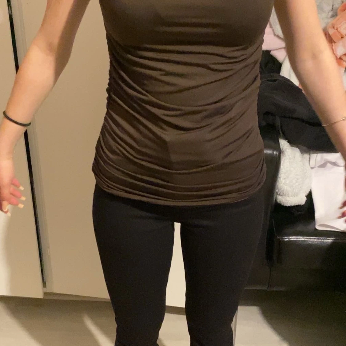 Brun åtsittande linnetopp