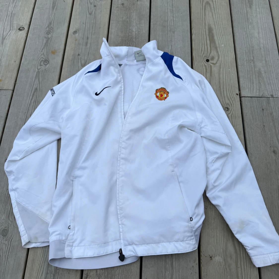 Vit Manchester United träningsjacka från Nike