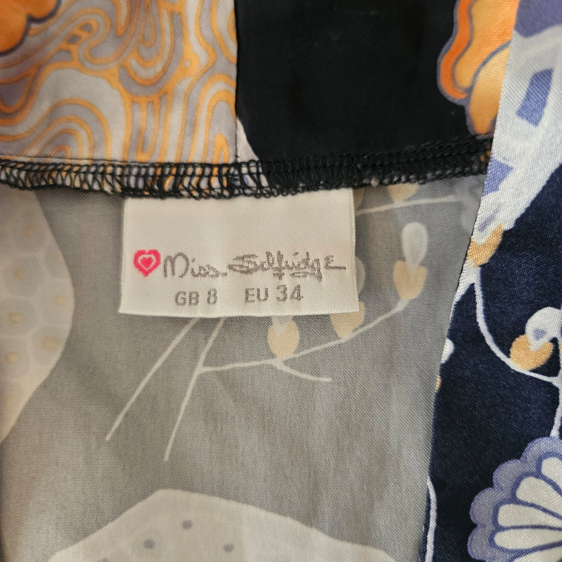 Blommig omlotttröja  - 1