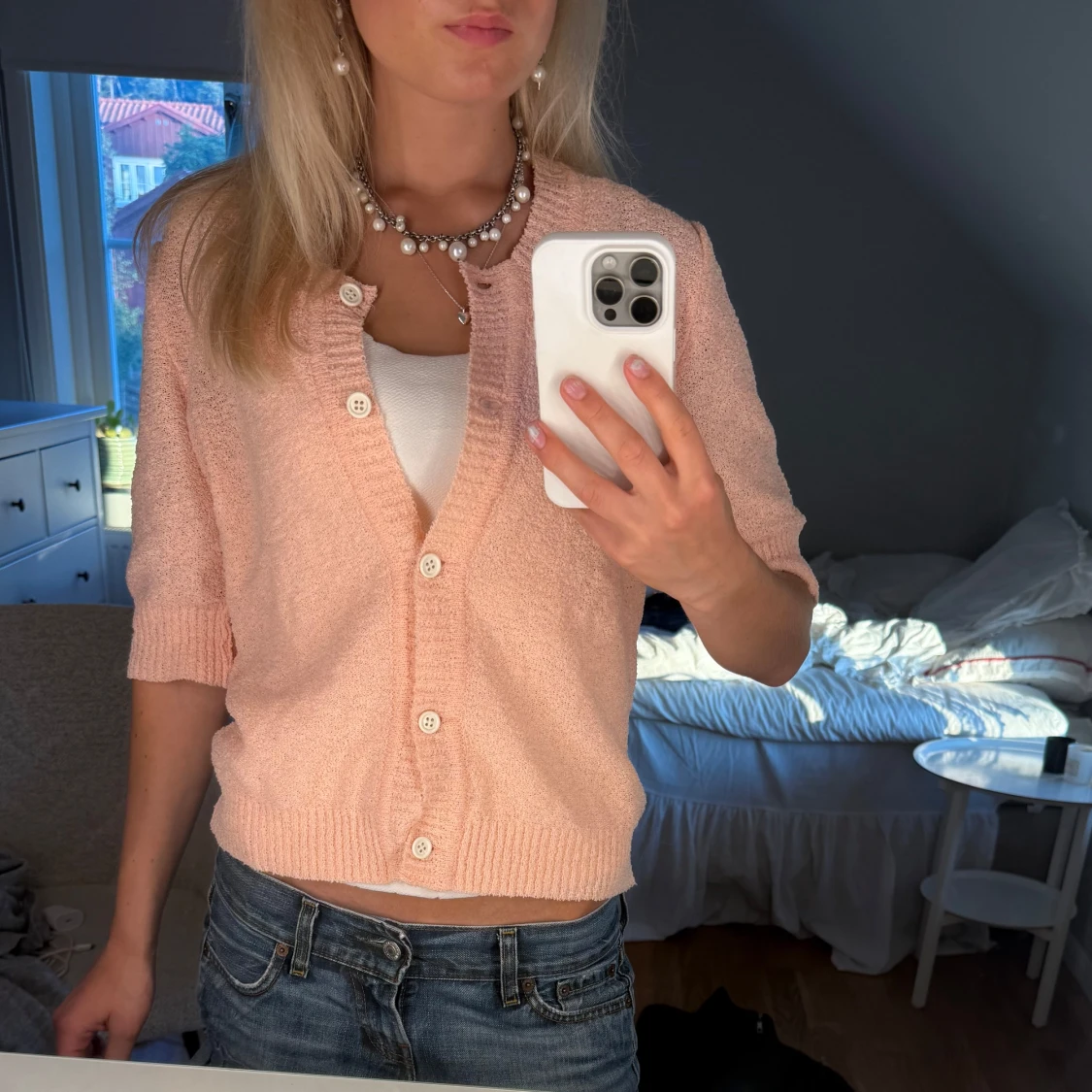 Ljusrosa stickad kofta med knappar - 1