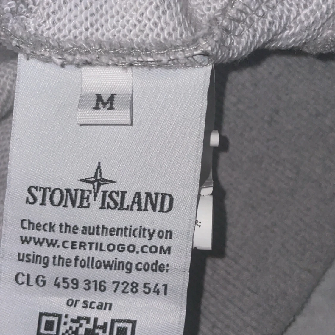 Grå hoodie från Stone Island