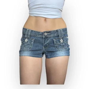 Lowrise jeans shorts - Decided to sell these lowrise jeans shorts from Angels, can't find the size label (fits an S in my opinion) Measurements: waist across: 37cm and total length: 22cm. Feel free to reach out if you have any questions about other measurements or details! they are pants ive sewn into shorts