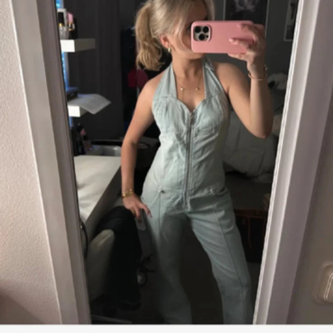 Ljusblå ärmlös jumpsuit