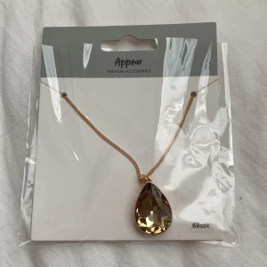 Halsband med droppformad kristall från Appear - Helt ny, aldrig använt 