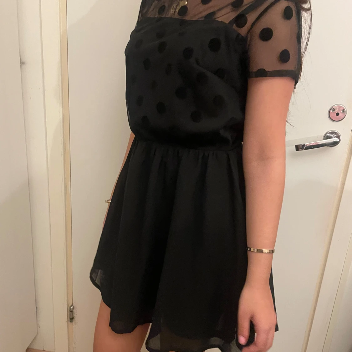 Svart prickig kortklänning från H&M Divided