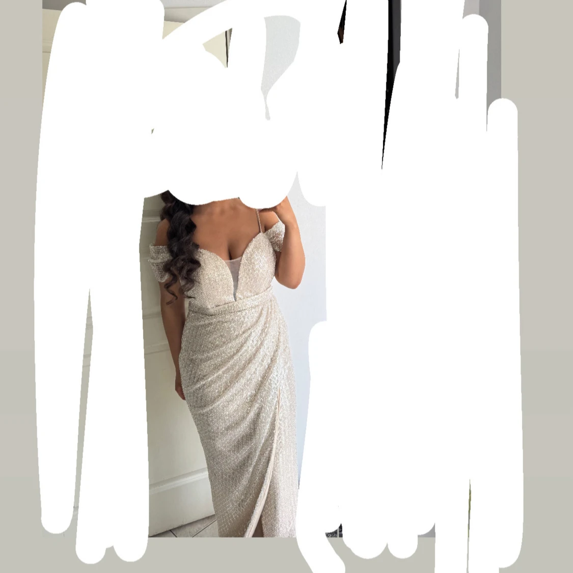 Glittrig långklänning från Sasha