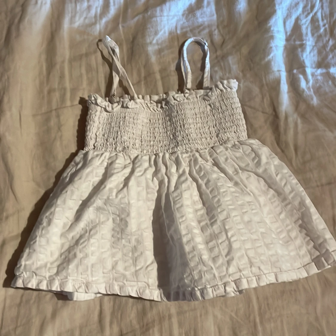 Vit linnetopp från Cope