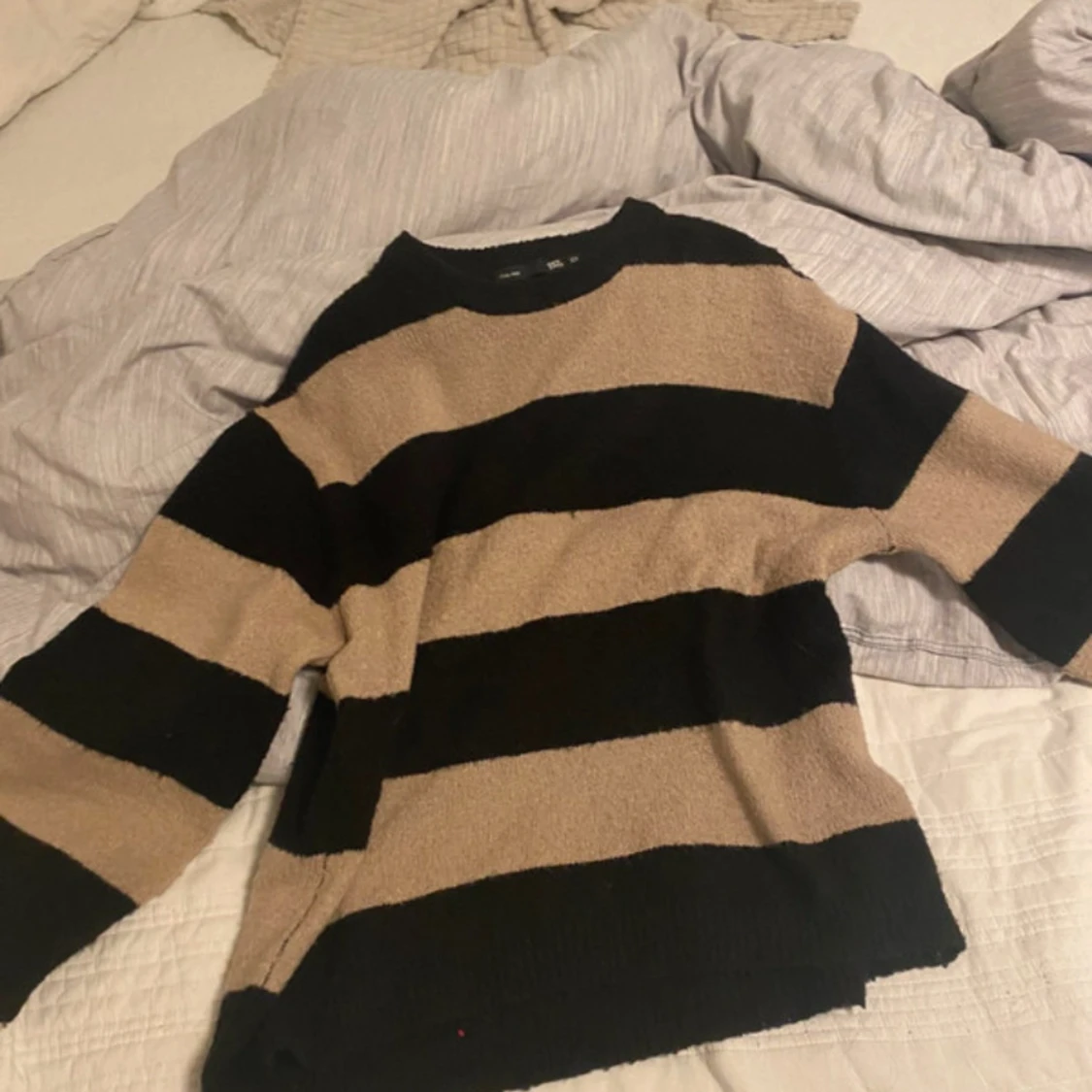 Randig stickad tröja från 157