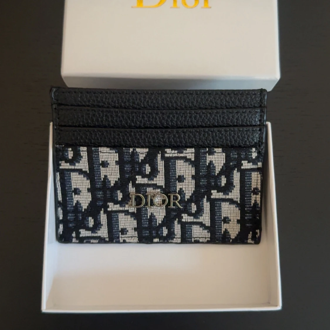 Plånbok i svart och beige - 1