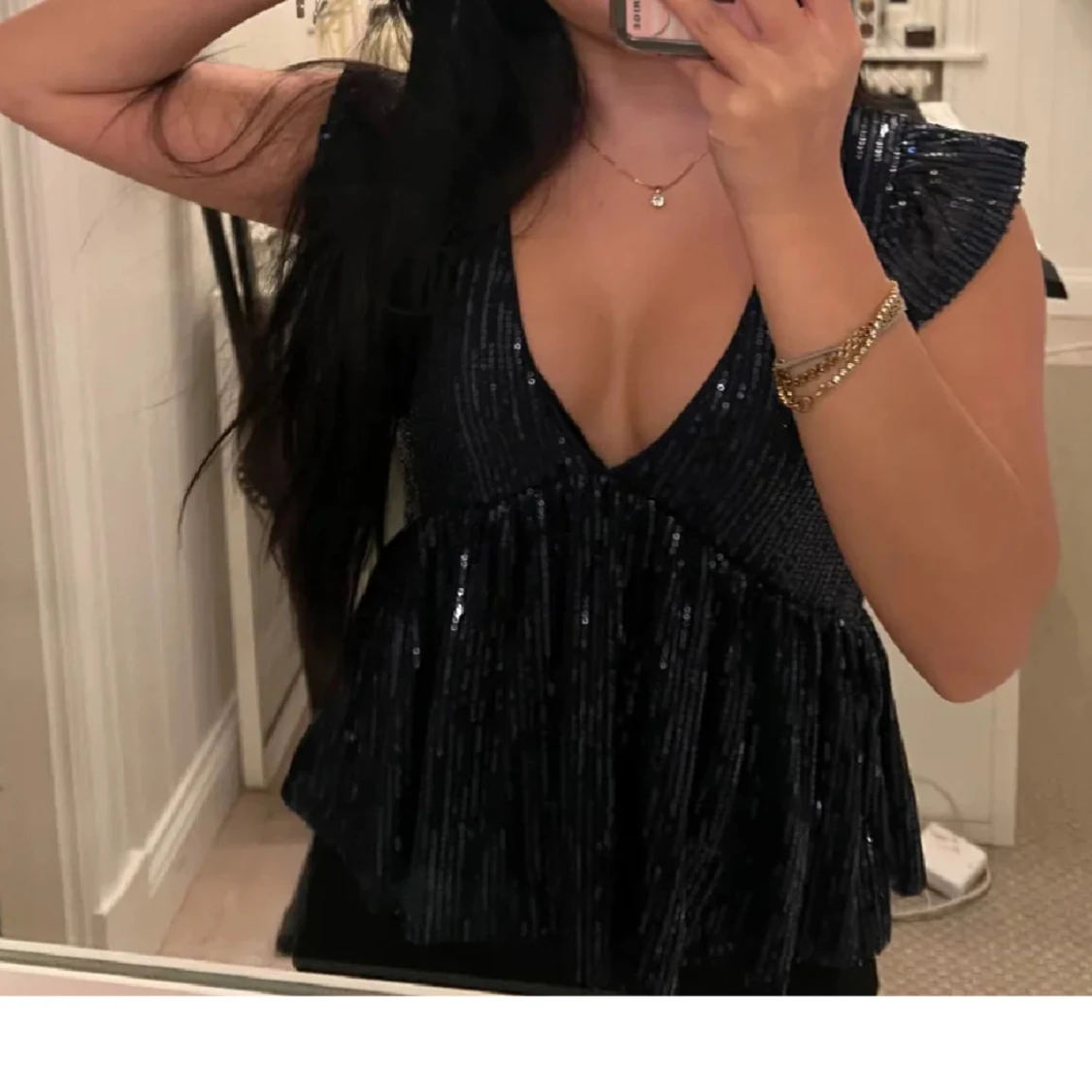 Glittrig mörkblå topp från Nelly - 2