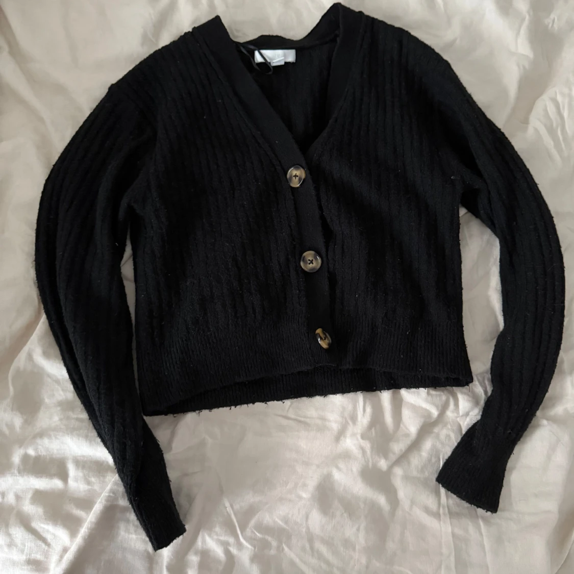 Svart ribbad kofta från H&M