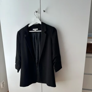 Kavaj - Svart kavaj från h&m