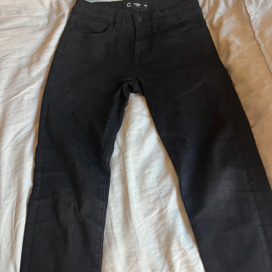 Svarta slim jeans från Cubus