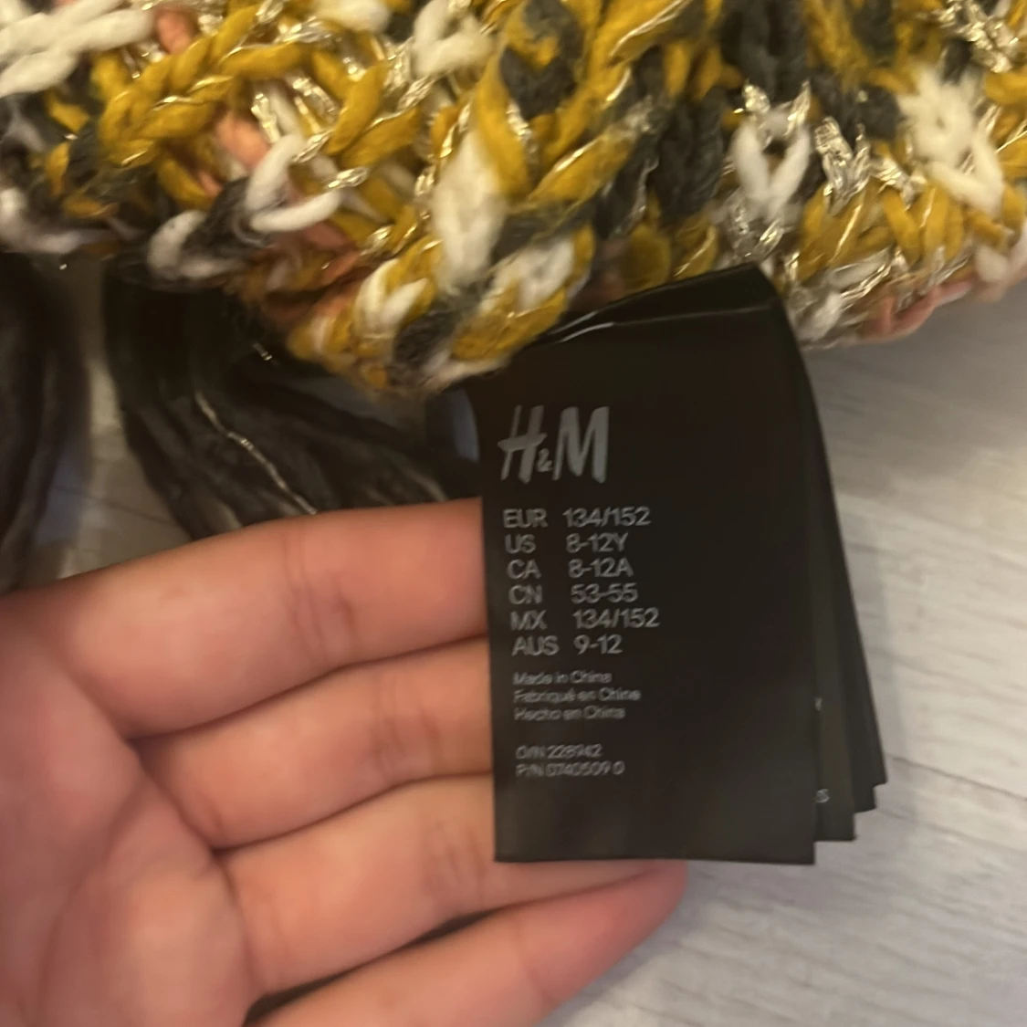 Mönstrad stickad poncho från H&M - 2