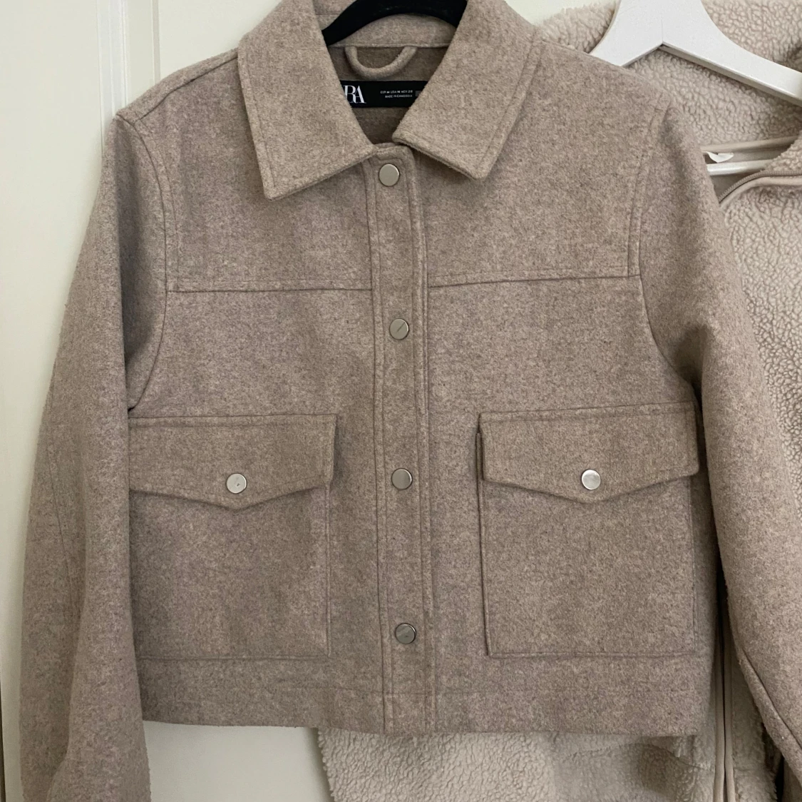 Beige kappa från Zara