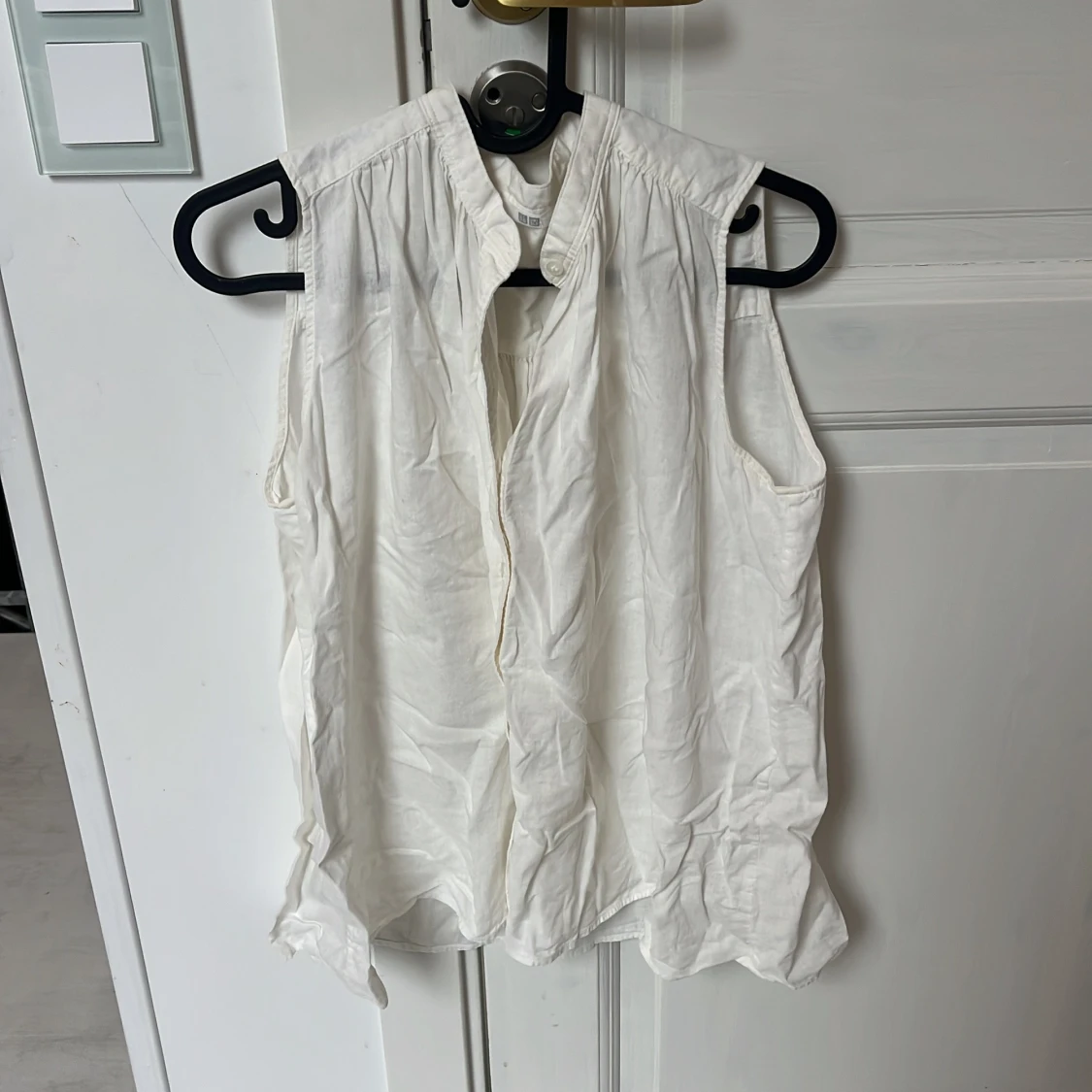 Vit ärmlös blus från Uniqlo
