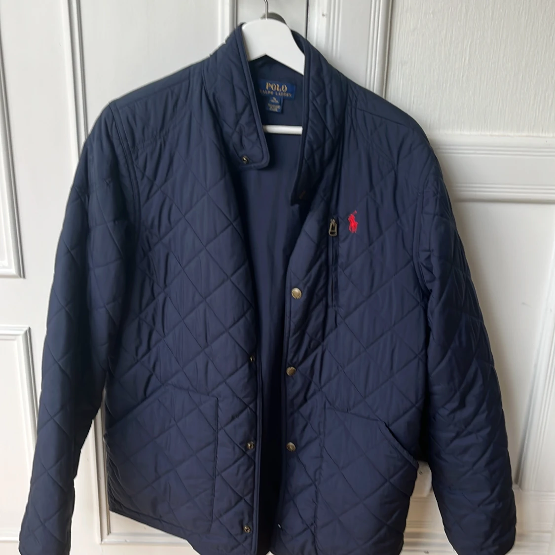 Mörkblå quiltad jacka Polo Ralph Lauren