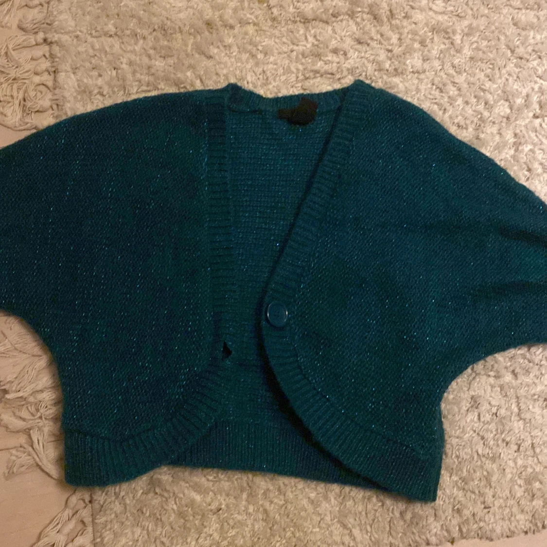 Glittrig kofta från H&M