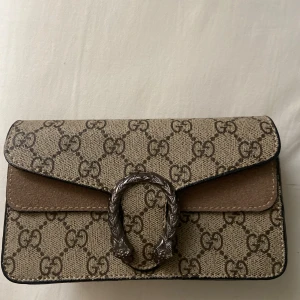 G u c c i dionysus - En söt axelremsväska i beige