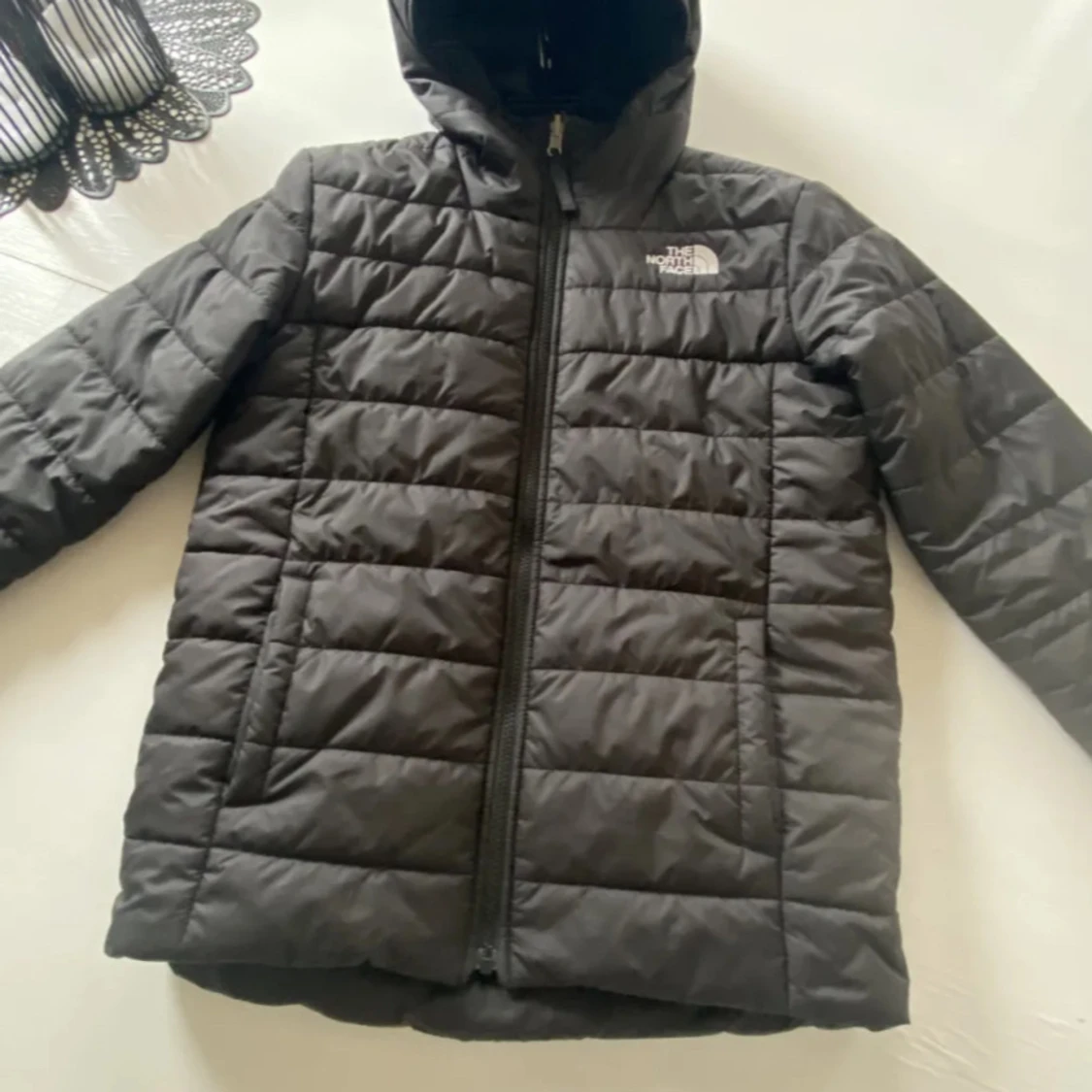 Svart quiltad pufferjacka The North Face - 1