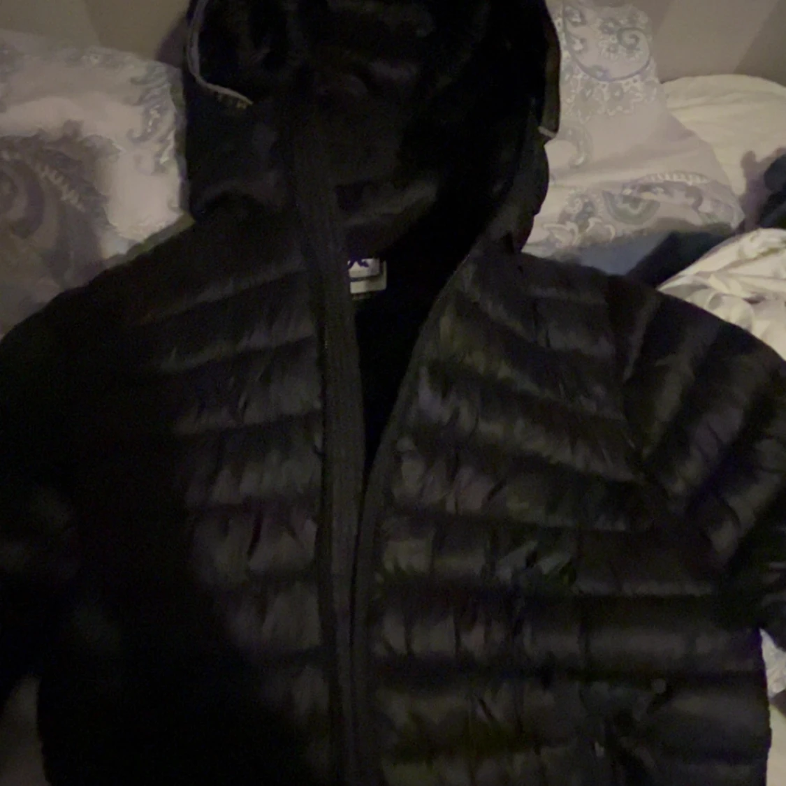 Svart dunjacka från McKinley