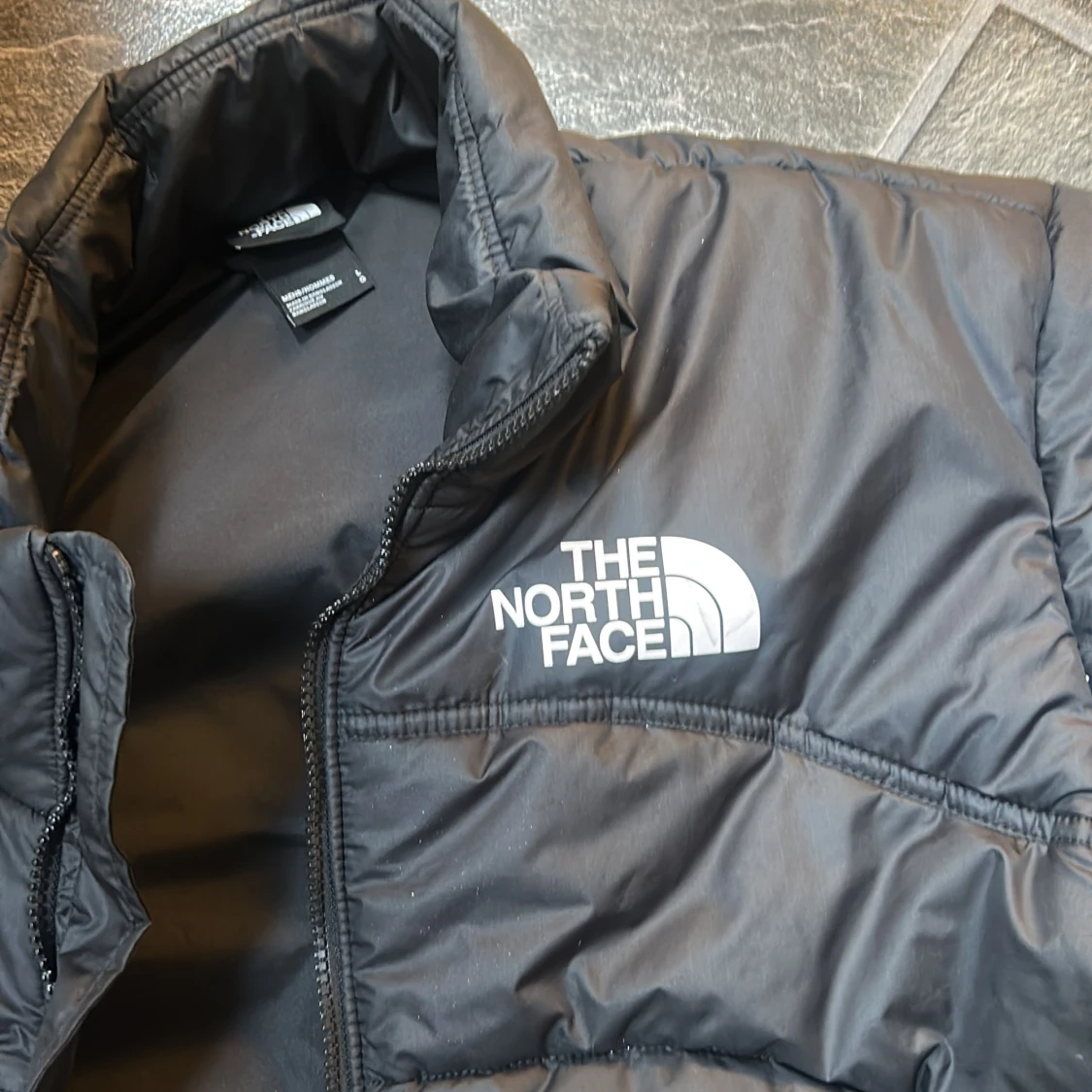 Svart pufferjacka från The North Face - 1