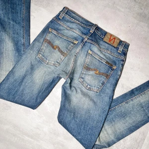 Nudie jeans - Nudie jeans | Modell Grim Tim | Super bra skick | Storlek W28 L32. 