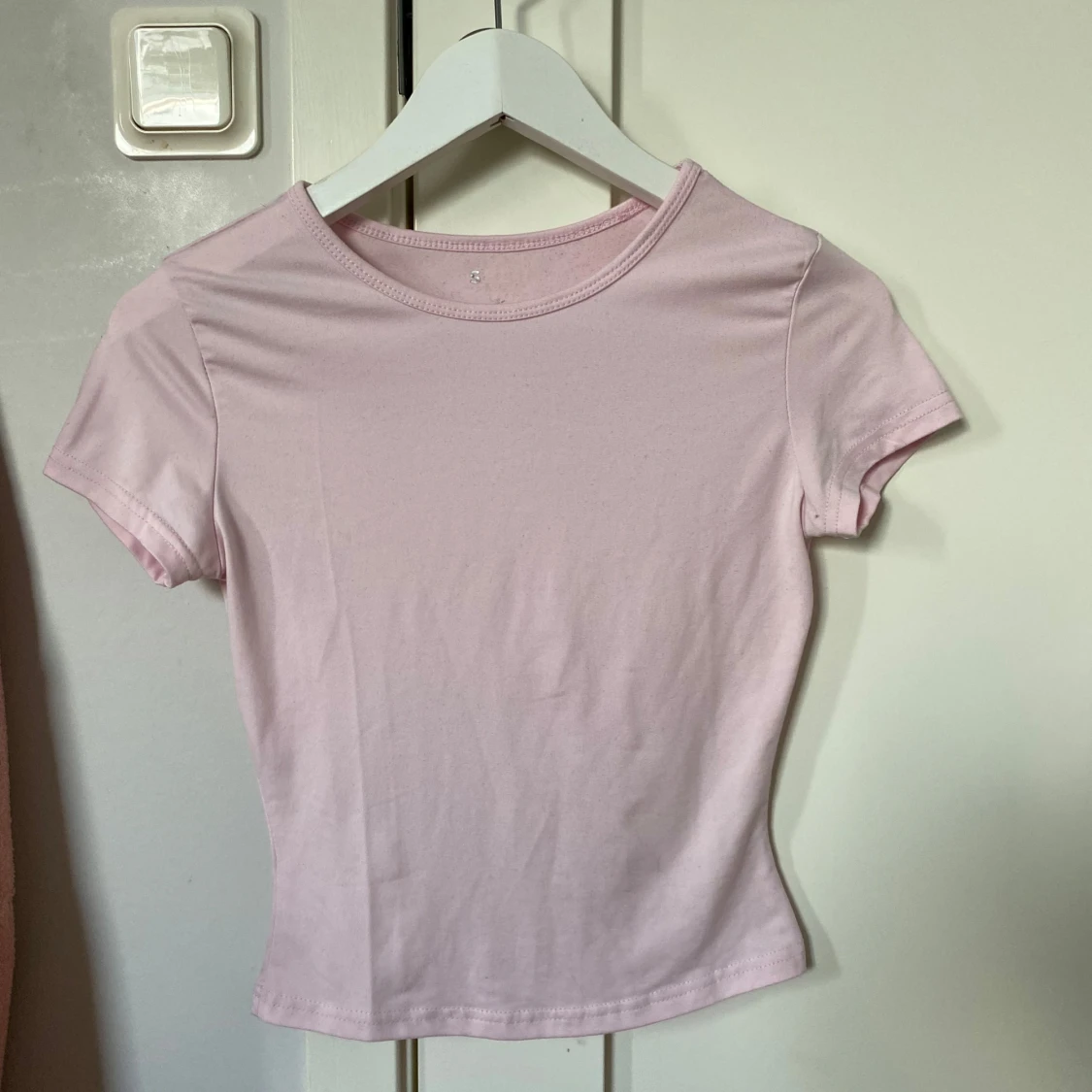 Ljusrosa croppad topp i bomull