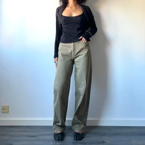 Khaki Wide Jeans - • Khaki green wide leg, high waist jeans. Model “Rail”  • SIZE - W24/L30 (Fits and XS-S) • BRAND -  Weekday • MATERIAL - 100% Cotton