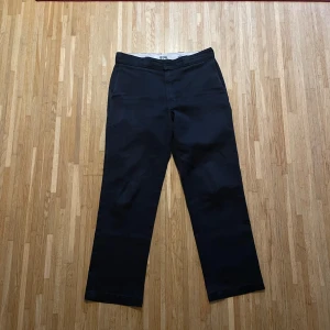 Dickies 874 Original - Svarta Dickies med en klassisk rak passform.