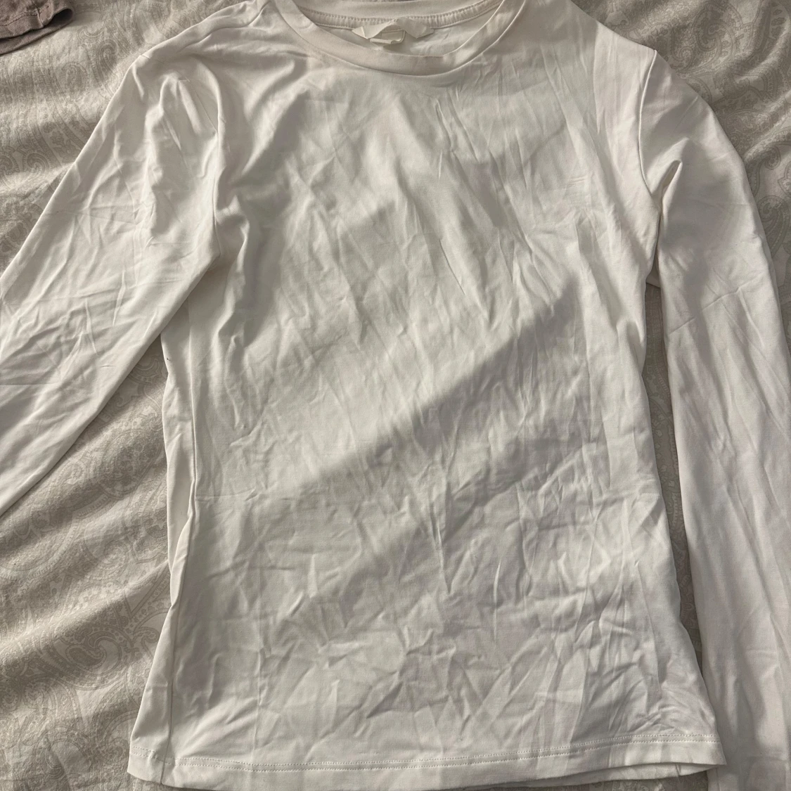 Vit långärmad tröja