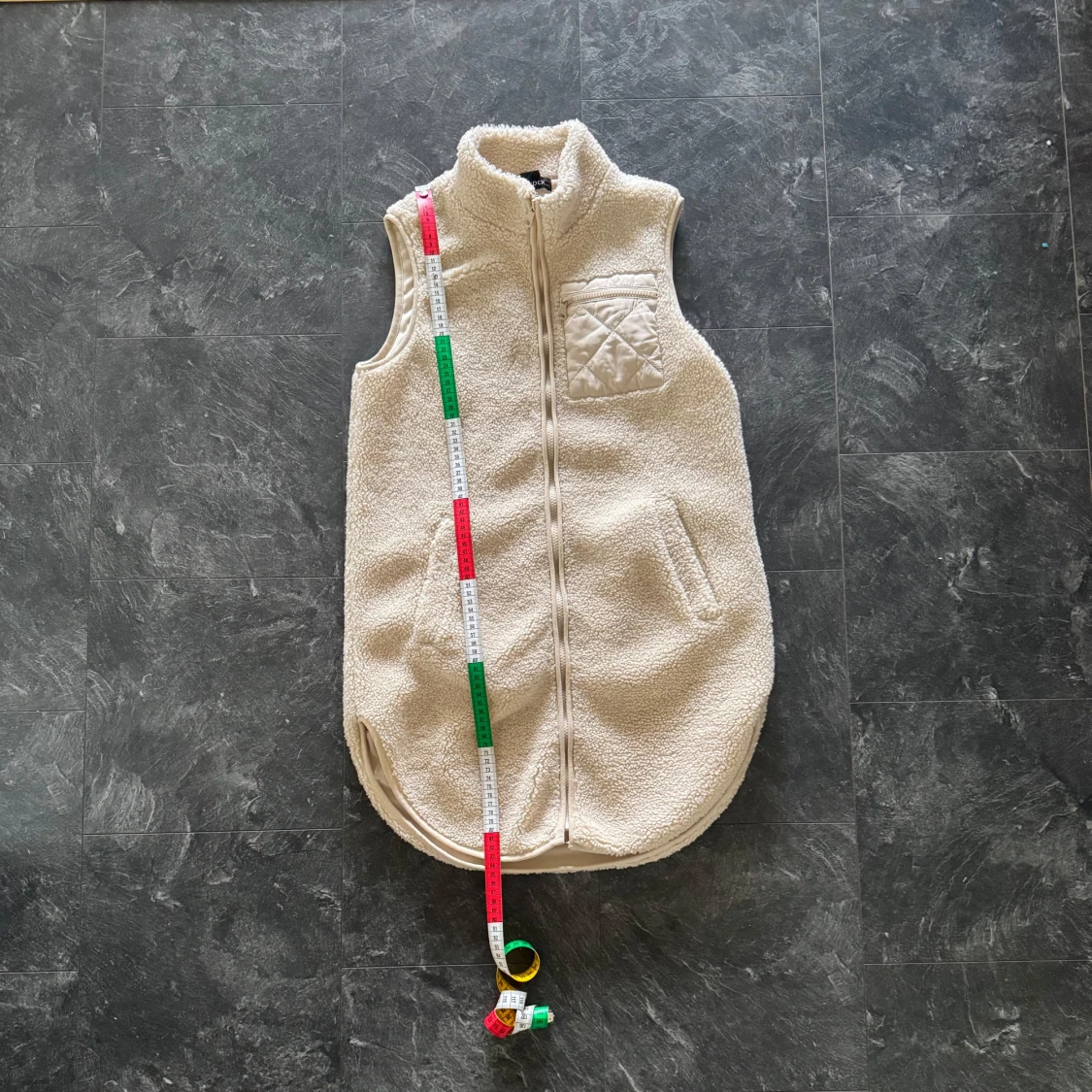 Beige fleeceväst från Lindex i XS