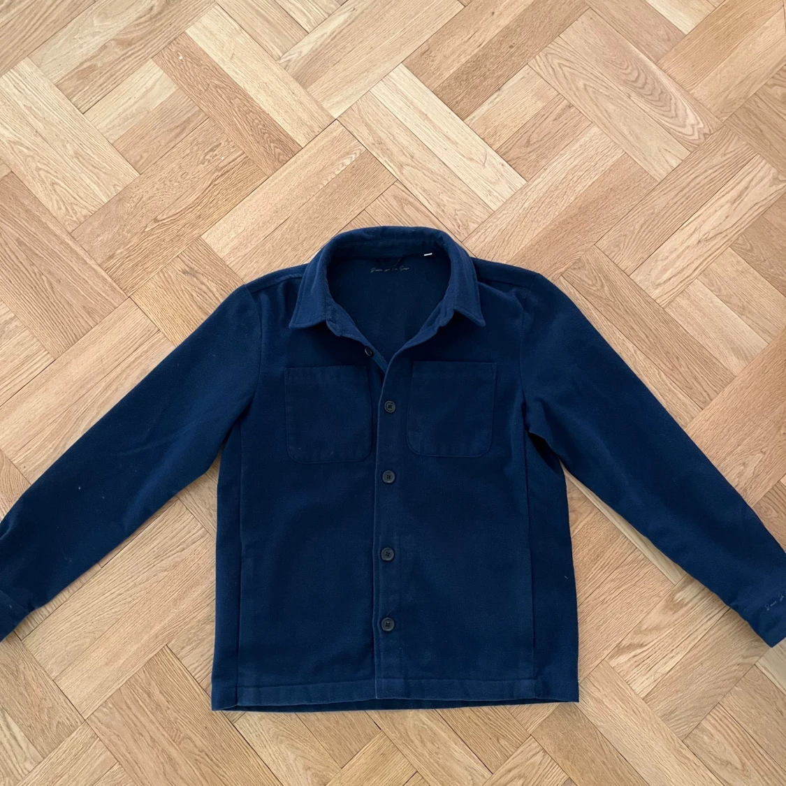 Mörkblå fleece overshirt från Donce de la sense strl M