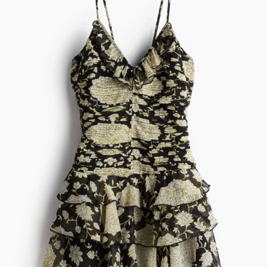 Blommig volangklänning med smala axelband