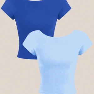 Öppen i ryggen toppar  - Två super snygga toppar som är öppna i ryggen, säljer då dem är för små, aldrig använda 