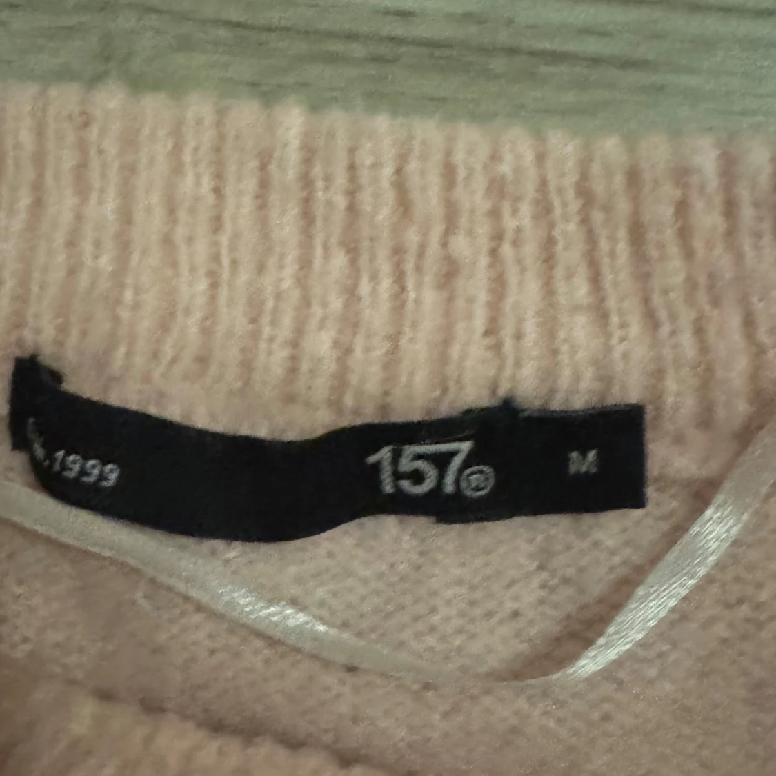 Ljusrosa stickad tröja från 157 - 2