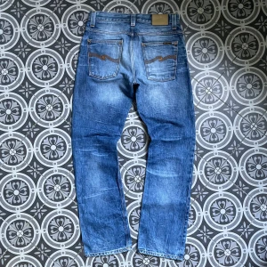 Nudie jeans  - Ett par sjuk snygga nudie jeans i modell averaged joe i 9/10 skick 🤩skriv gärna vid funderingar ✨✅