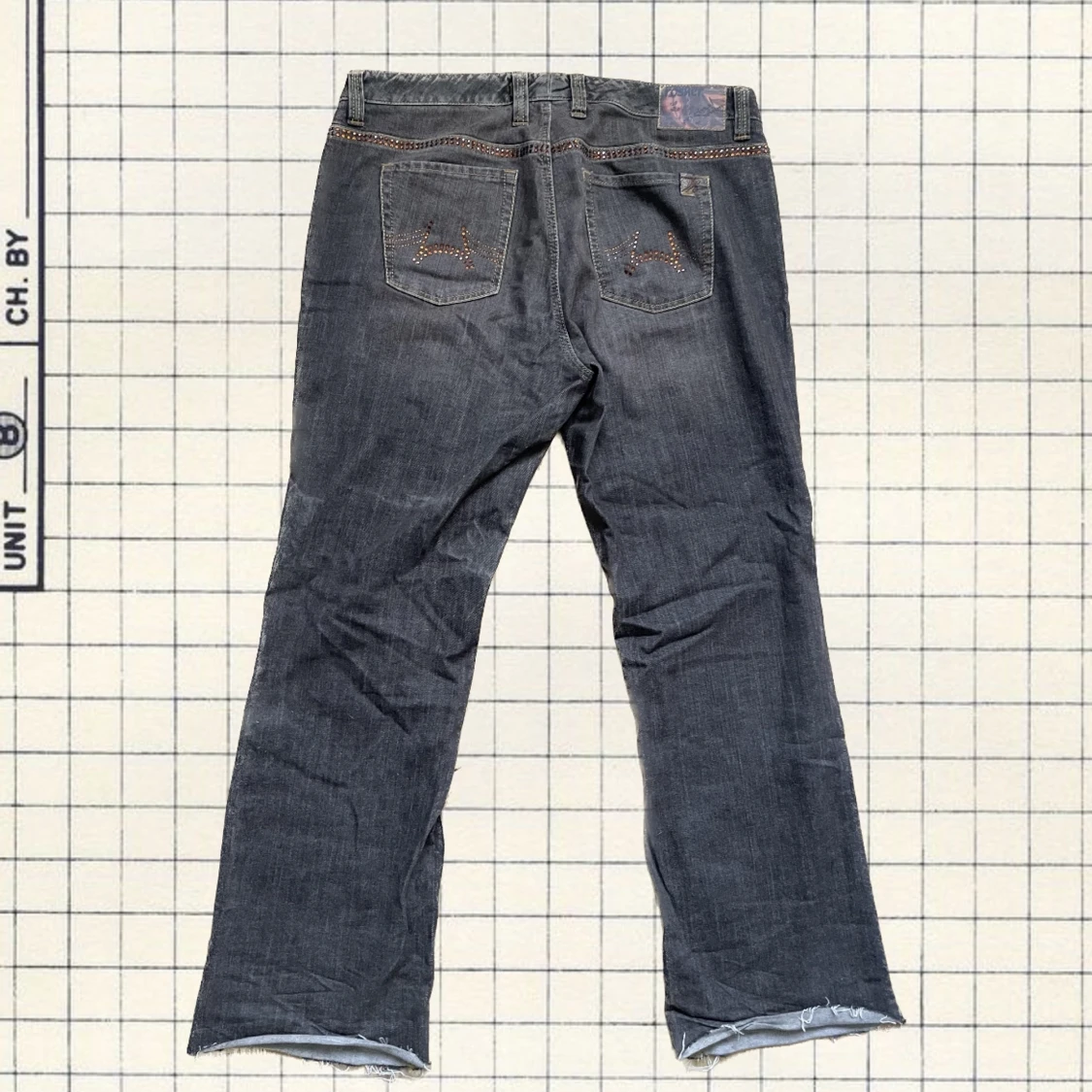 Vintage bruna utsvängda jeans med orangea pynt - 90