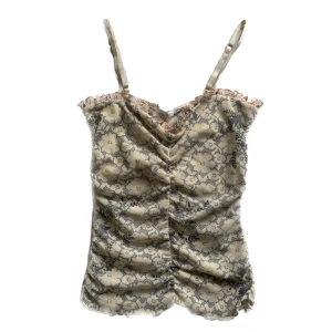 Mesh linne - Superfint mönstrat linne i mesh. Passar s-m. Köpt secondhand 