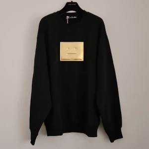 ACNE STUDIOS Face Sweatshirt  - Acne Studios sweatshirt with the "lagom" face logo in gold. New condition! Bought at sample sale and realised its too small for me, so selling. Green mark in label, see 2nd photo. Comfortable and oversized, can fit xs-m size! 