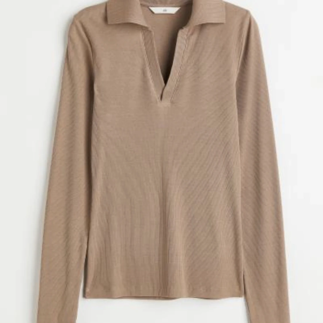 Beige topp med krage