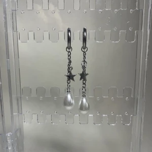 Star pearl earring/s - 85kr/par45kr/st
