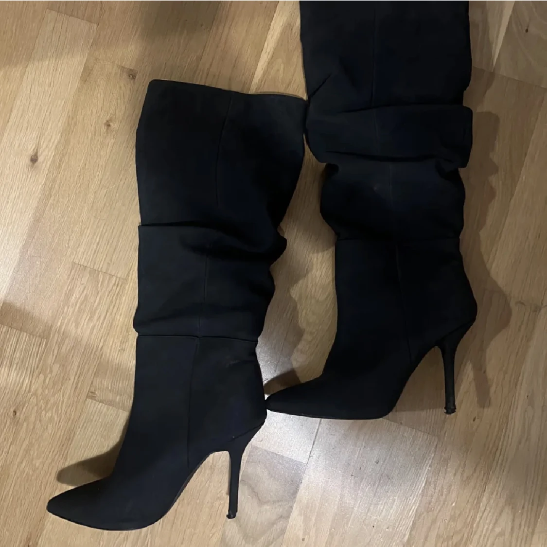 Svarta stövlar - 91