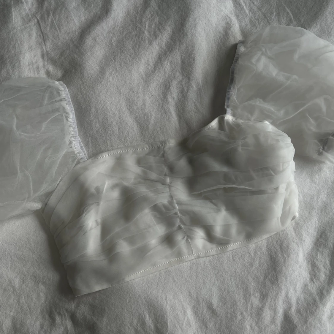 Croptop med meshärmar 