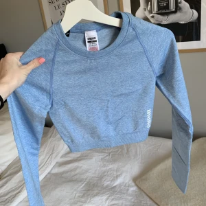 Gymshark topp, XS - Ljusblå träningstopp från Gymshark ⭐️ endast testad så i nyskick!  Tryck gärna på köp nu! 