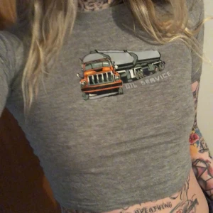 Grå babytee  - Från barn