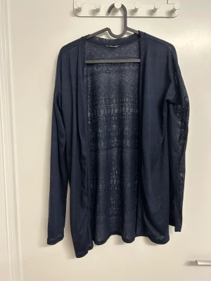 Mönstrad cardigan - Storlek M