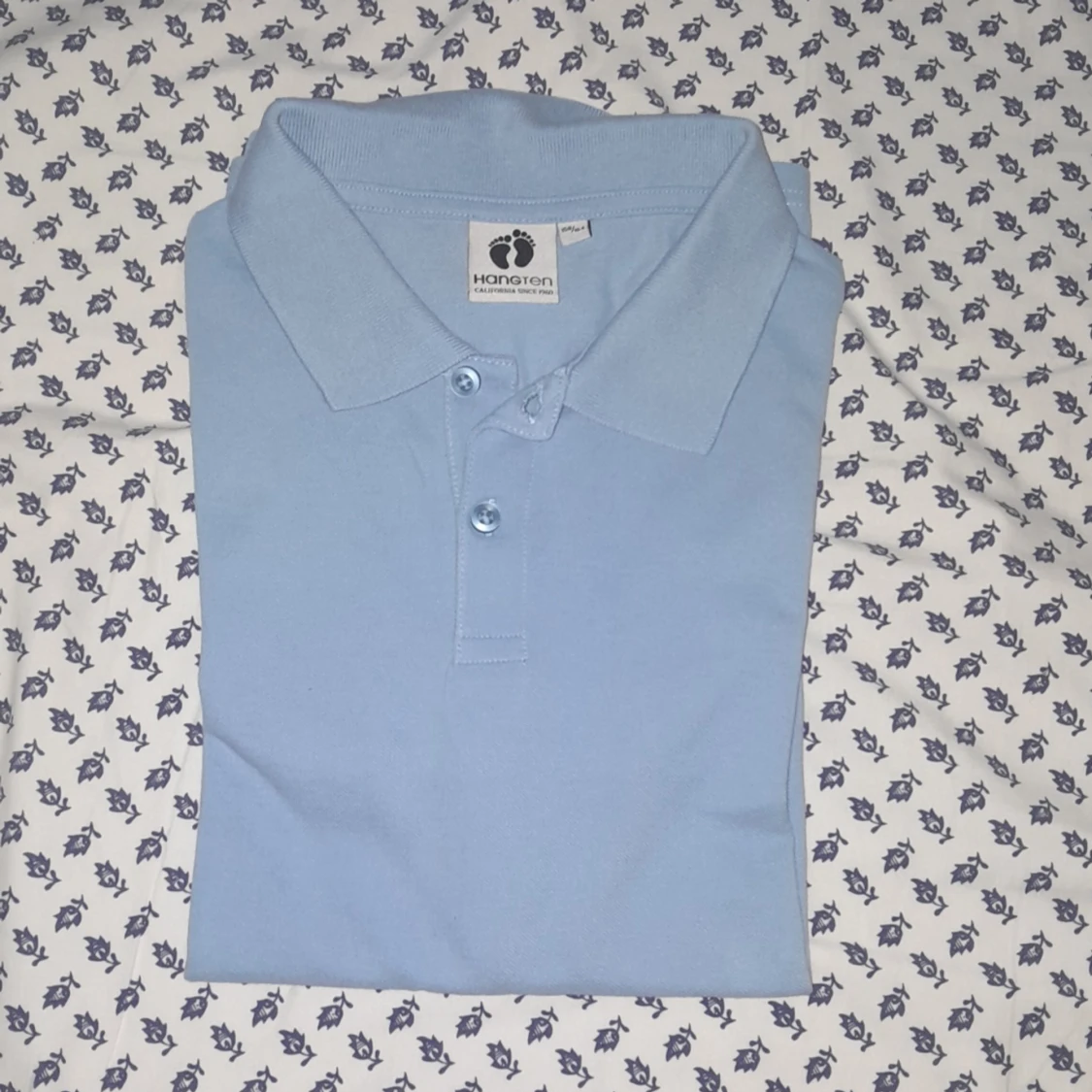 Ljusblå pike tröja